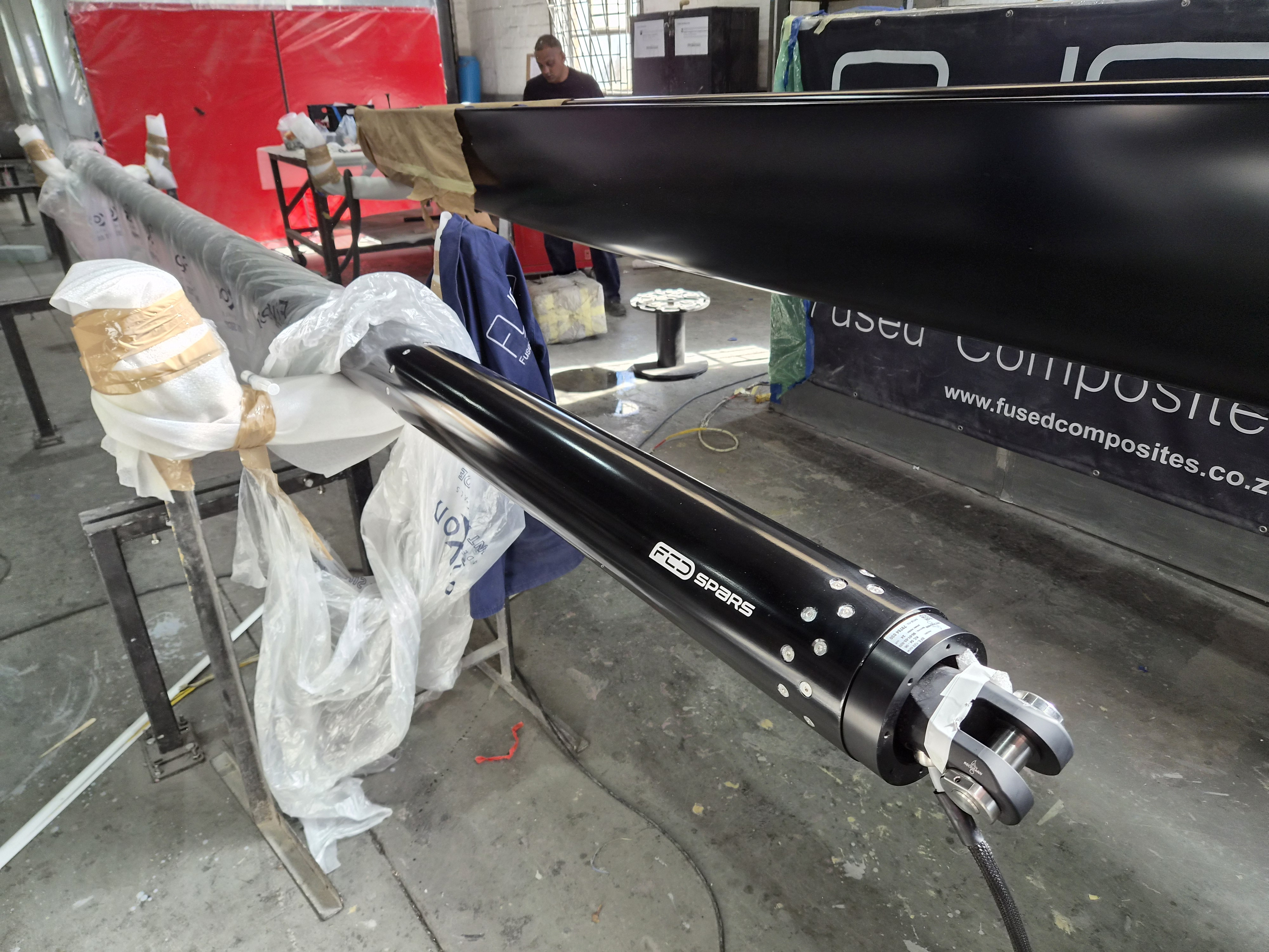 Furling boom construction and completed work
