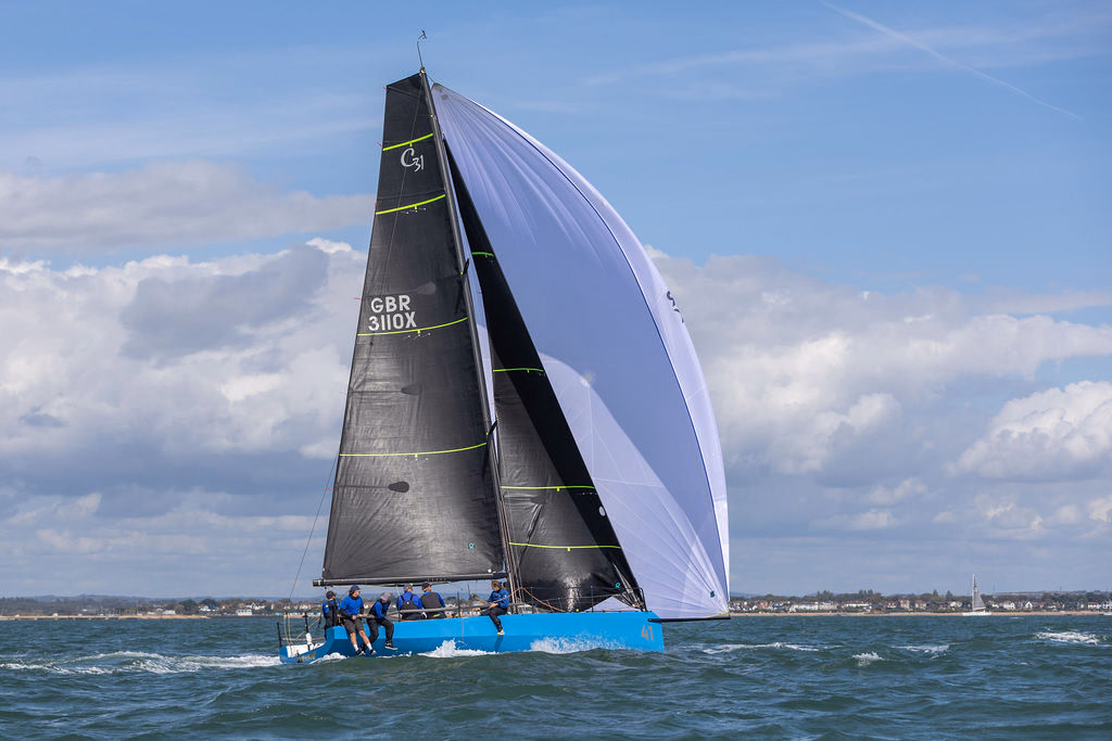 Cape 31 racing under sail