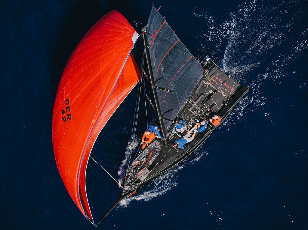 Aerial view of a Cape 31 sailing under spinnaker